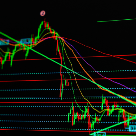 Alt: Trader analyzing candlestick patterns on financial charts.