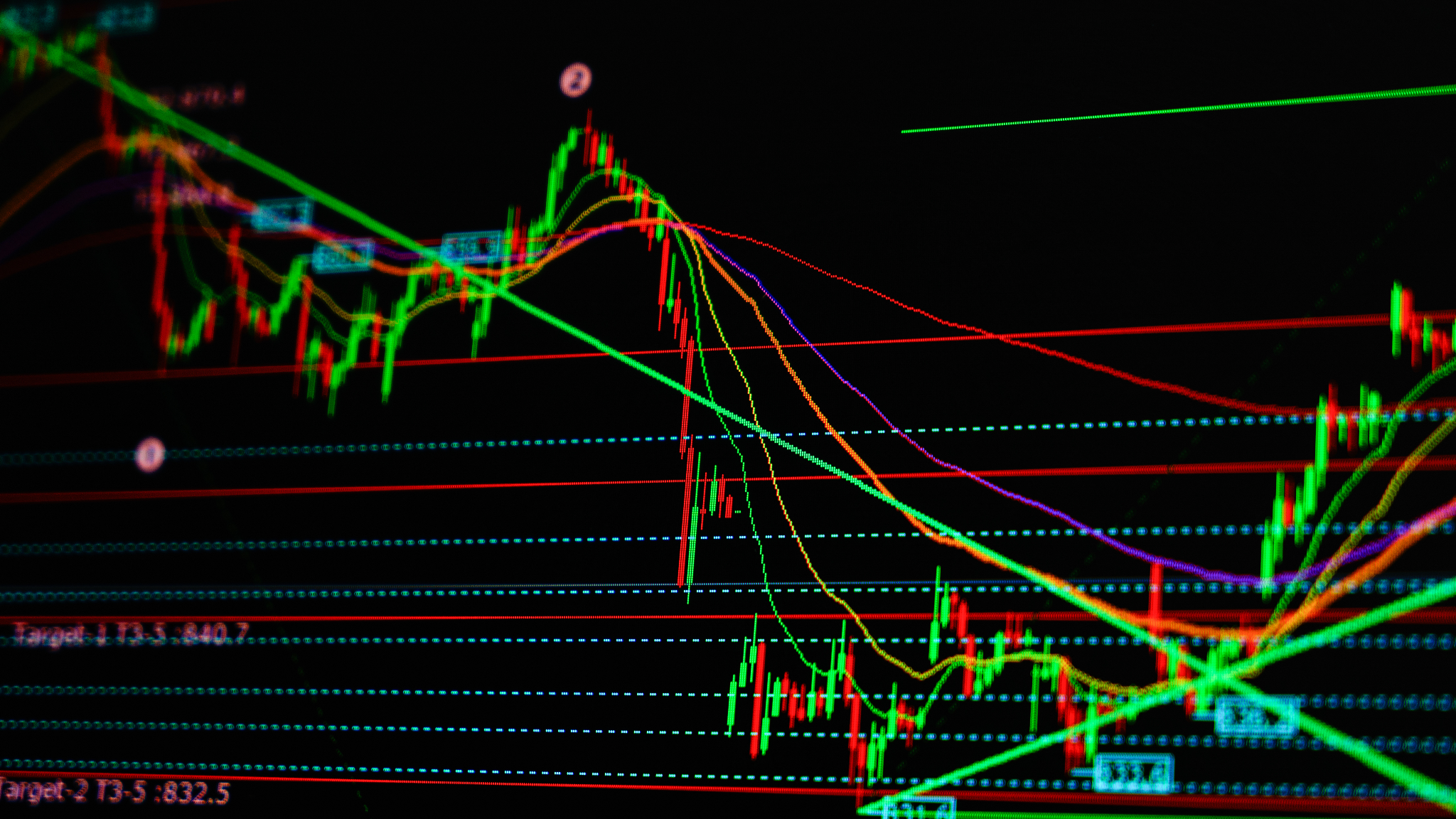 Trader analyzing candlestick patterns on financial charts.