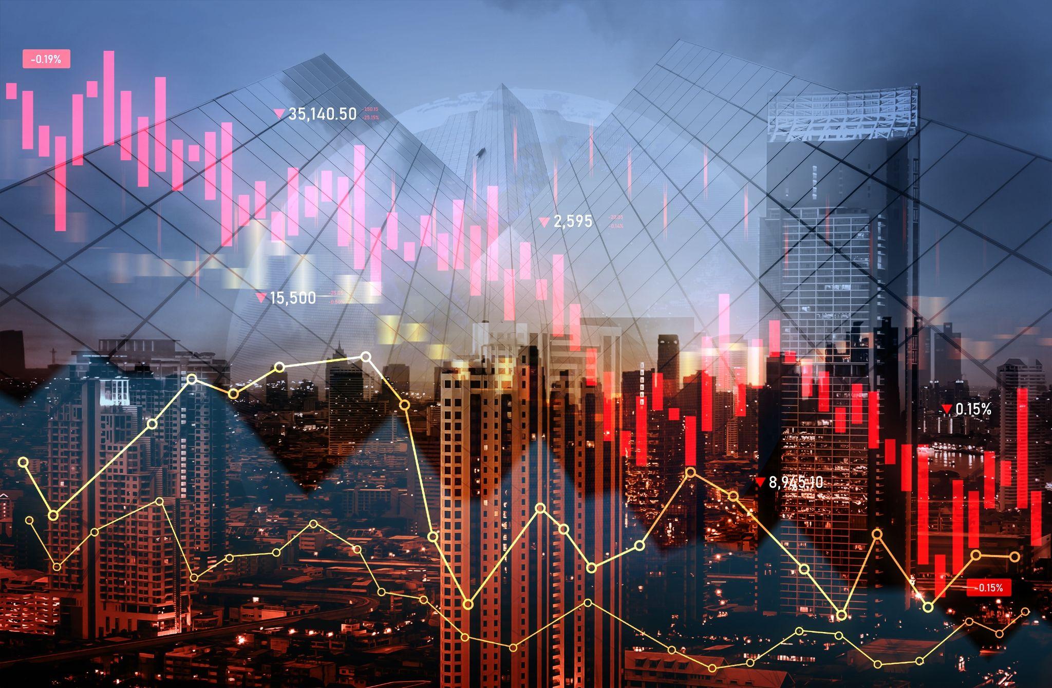 Declining stock market graphs overlap a modern city backdrop, illustrating a market crash in double exposure.