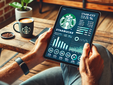 Financial analyst reviewing Starbucks earnings report on a tablet in a cozy workspace with a coffee cup